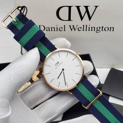 DANIEL WELLINGTON EXCLUSIVE BLACK AND GREEN LEATHER WRISTWATCH WITH GOLD AND WHITE FACE (SAWW)